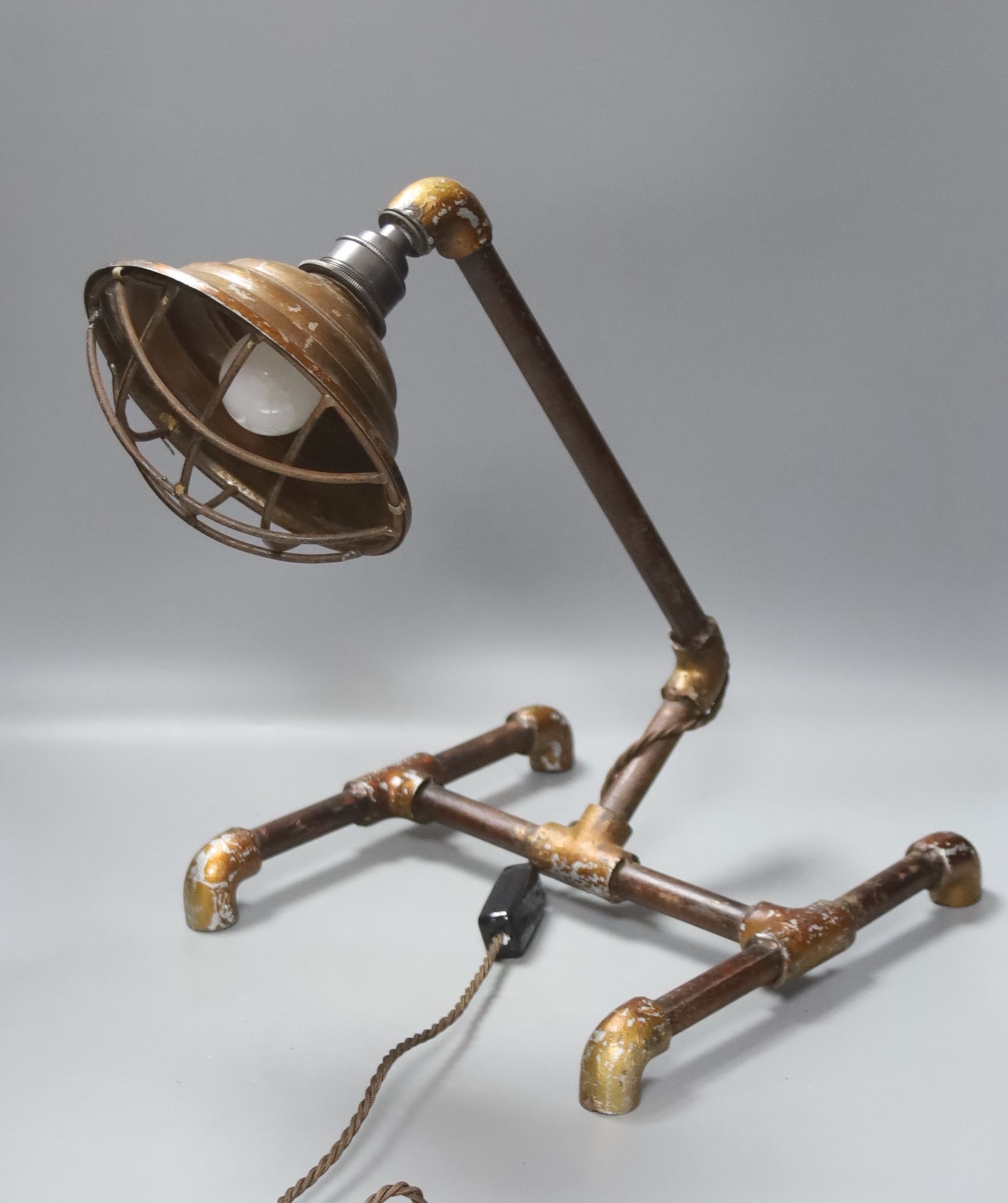 A pair of French industrial style table lamps